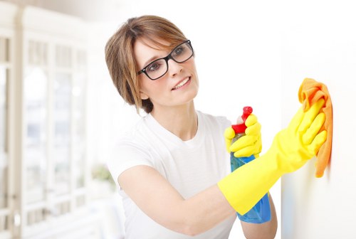 Safety-conscious carpet cleaning team working in a property
