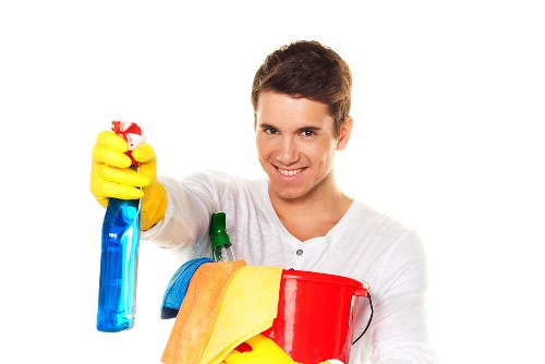 Technician preparing carpet for steam cleaning in a Farringdon property